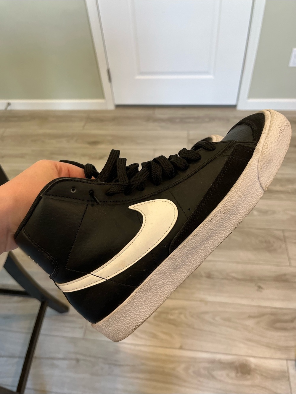 Nike Black Mid-Top Sneaker with White Swoosh
